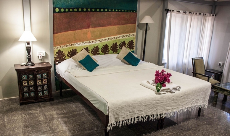 Imagen de la habitación del Hotel Leela Cottages. Foto 15