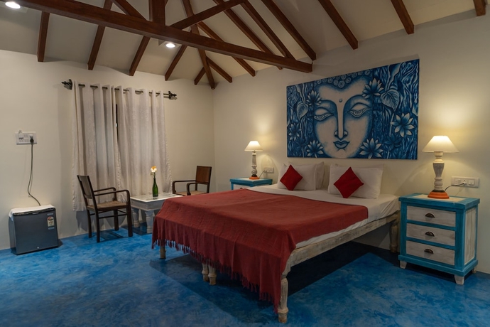 Imagen de la habitación del Hotel Leela Cottages. Foto 17