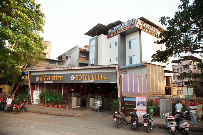 Imagen de la habitación del Hotel Leela. Foto 30