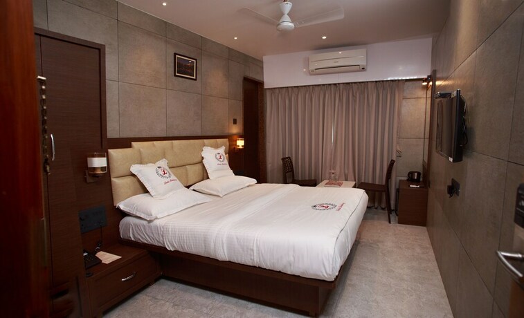 Imagen de la habitación del Hotel Leela. Foto 32