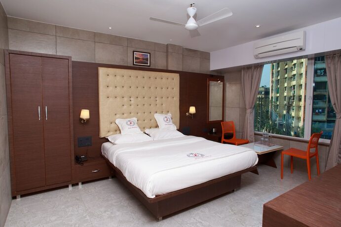 Imagen de la habitación del Hotel Leela. Foto 34