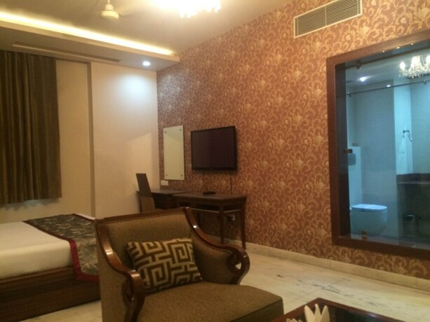 Imagen de la habitación del Hotel Leela Grande. Foto 11
