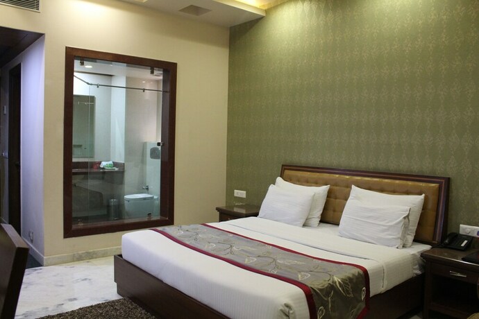 Imagen de la habitación del Hotel Leela Grande. Foto 12