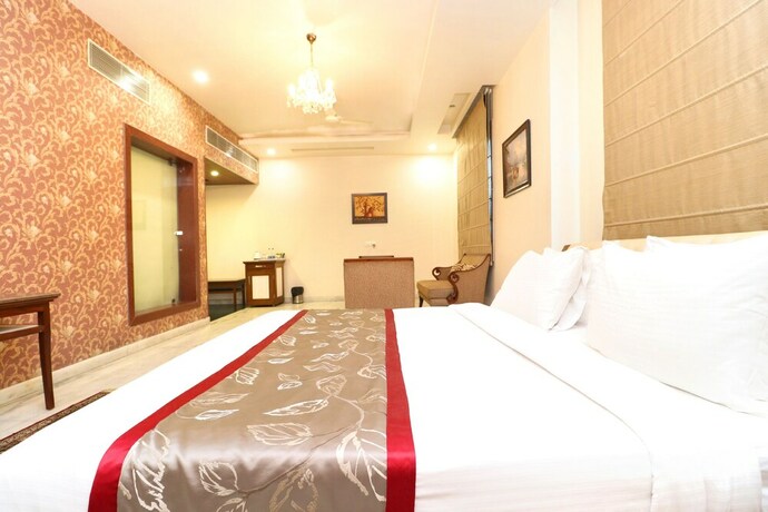 Imagen de la habitación del Hotel Leela Grande. Foto 15