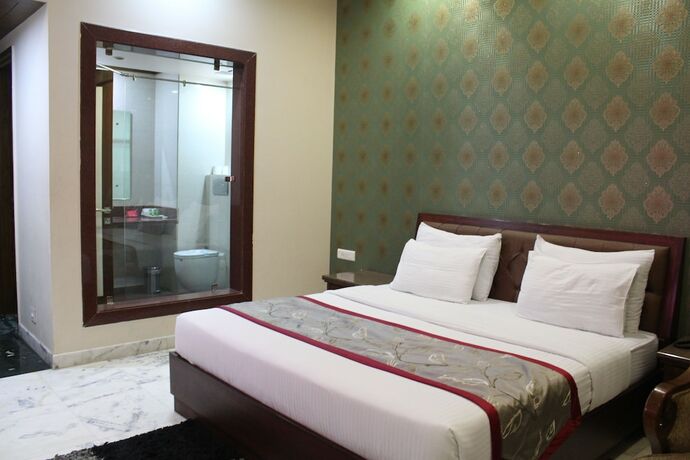 Imagen de la habitación del Hotel Leela Grande. Foto 19