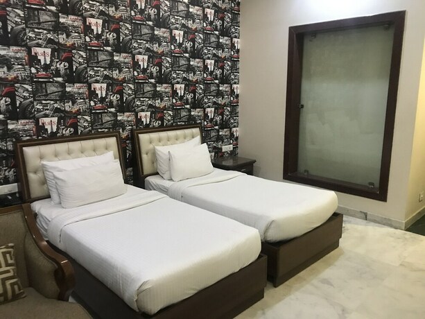 Imagen de la habitación del Hotel Leela Grande. Foto 24