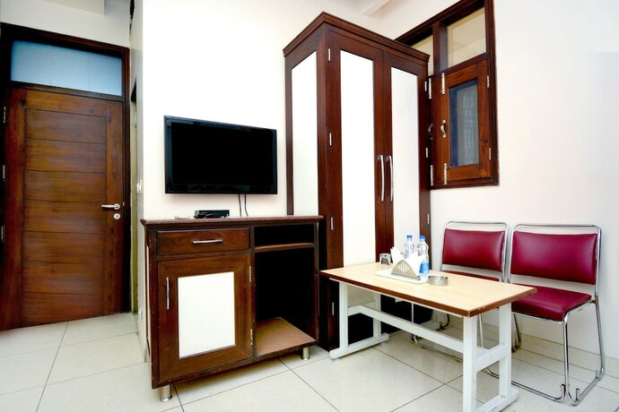 Imagen de la habitación del Hotel Leela Grande. Foto 30