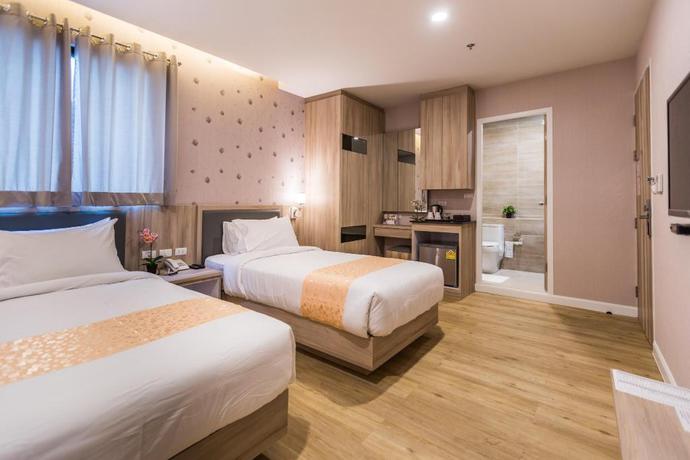 Imagen de la habitación del Hotel Leela Orchid. Foto 3