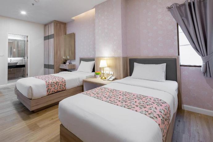 Imagen de la habitación del Hotel Leela Orchid. Foto 4