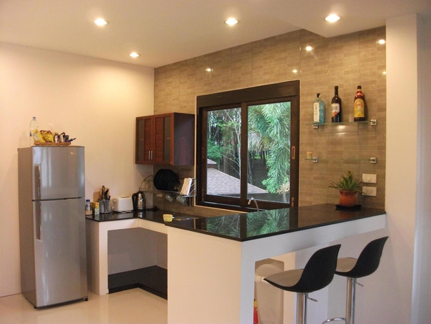 Imagen de la habitación del Hotel Leelawadee Garden Resort. Foto 7