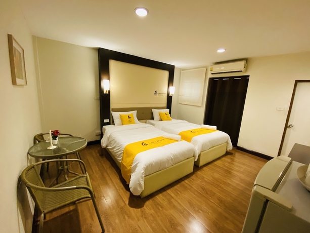 Imagen de la habitación del Hotel Lee's Mark Residence. Foto 15