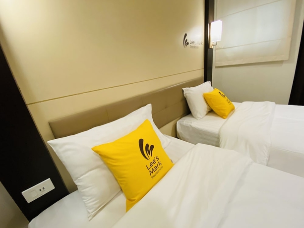 Imagen de la habitación del Hotel Lee's Mark Residence. Foto 16