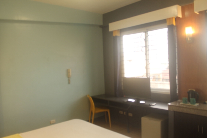 Imagen de la habitación del Hotel Leesons Residences. Foto 11