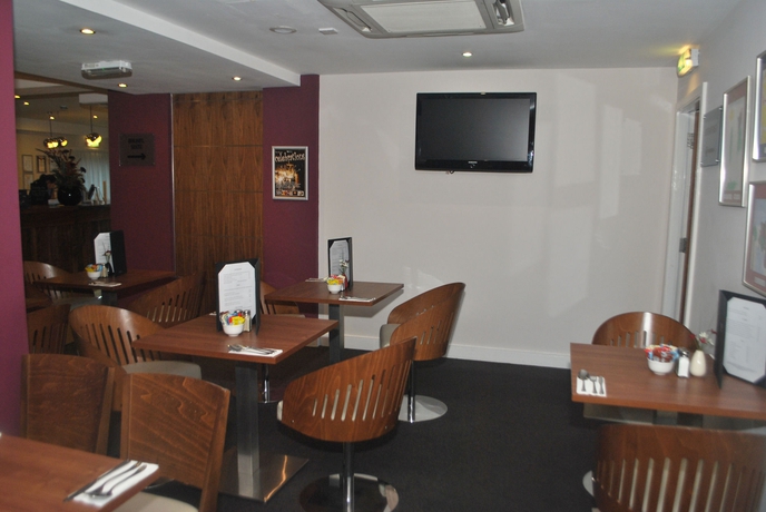 Imagen del bar/restaurante del Hotel Legacy Preston International. Foto 3