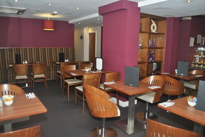 Imagen del bar/restaurante del Hotel Legacy Preston International. Foto 4