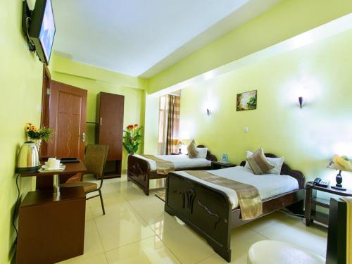 Imagen de la habitación del Hotel Legacy and Suites. Foto 6