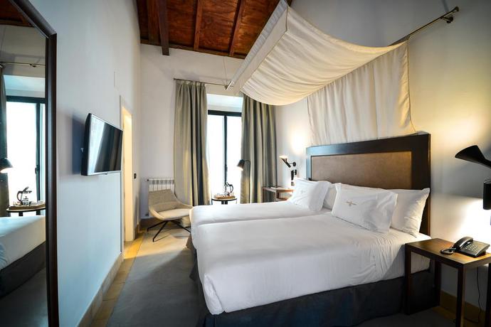 Imagen de la habitación del Hotel Legado Alcázar. Foto 6