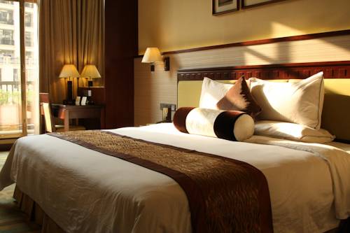 Imagen de la habitación del Hotel Legend International, Huizhou. Foto 4