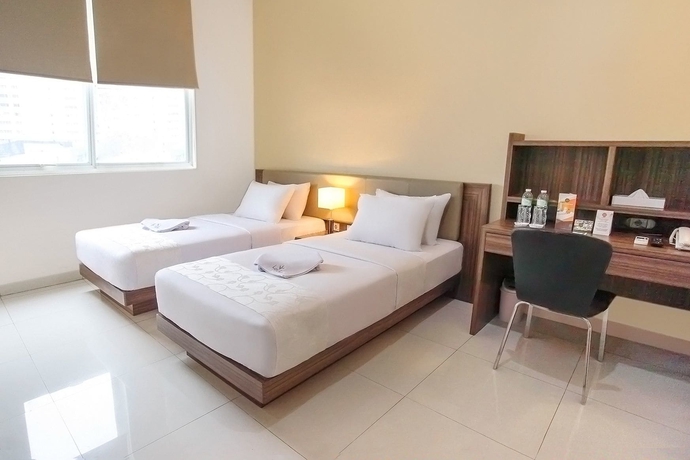 Imagen de la habitación del Hotel Legreen Suite Gatot Subroto. Foto 7