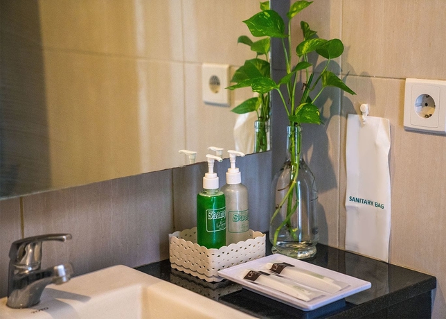 Imagen de la habitación del Hotel Legreen Suite Gatot Subroto. Foto 9