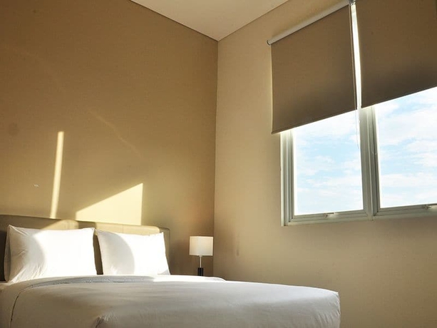 Imagen de la habitación del Hotel Legreen Suite Gatot Subroto. Foto 11