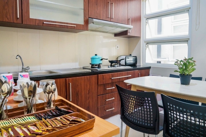 Imagen del bar/restaurante del Hotel Legreen Suite Gatot Subroto. Foto 4