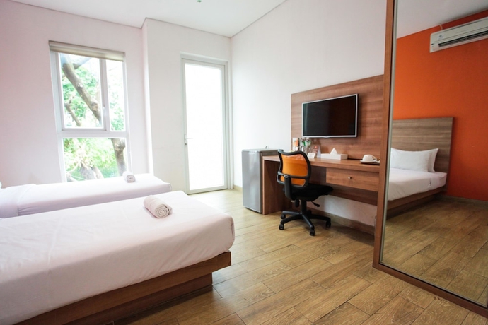 Imagen de la habitación del Hotel Legreen Suite Kuningan. Foto 4