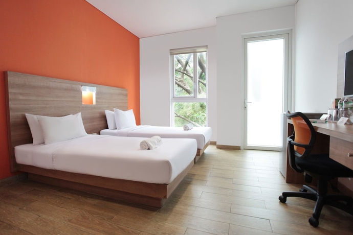 Imagen de la habitación del Hotel Legreen Suite Kuningan. Foto 5