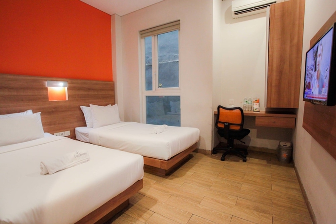 Imagen de la habitación del Hotel Legreen Suite Kuningan. Foto 6
