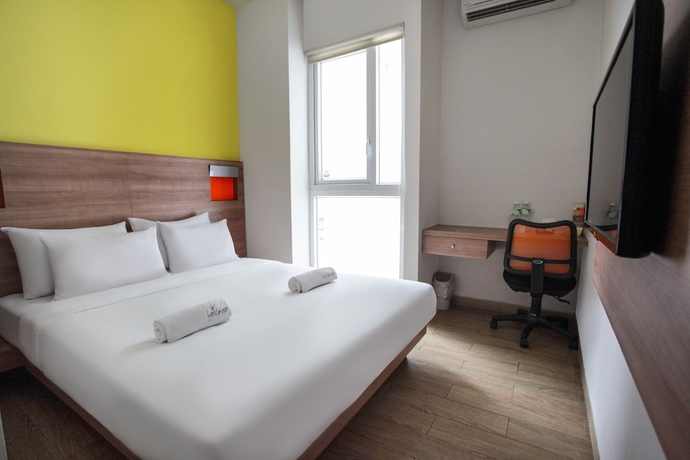 Imagen de la habitación del Hotel Legreen Suite Kuningan. Foto 7