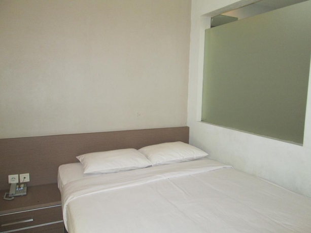 Imagen general del Hotel Legreen Suite Penjernihan. Foto 8