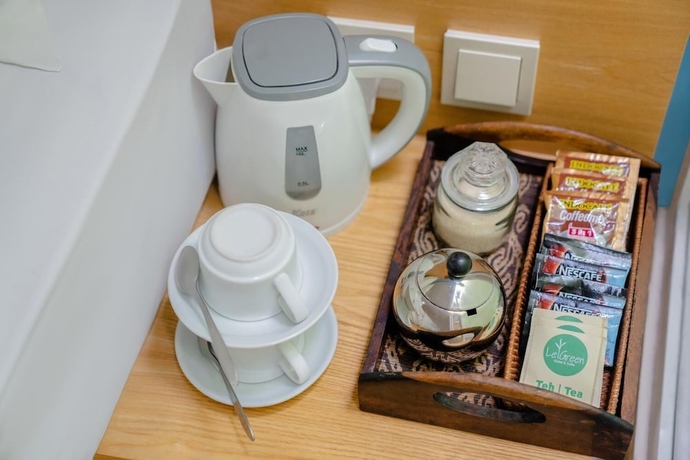 Imagen de la habitación del Hotel Legreen Suite Senayan. Foto 15