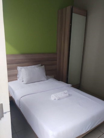 Imagen de la habitación del Hotel Legreen Suite Supomo. Foto 2