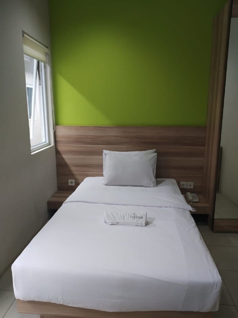 Imagen de la habitación del Hotel Legreen Suite Supomo. Foto 3