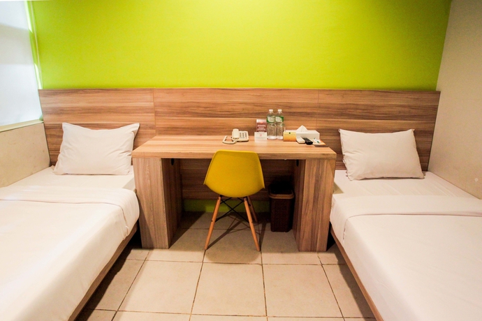 Imagen de la habitación del Hotel Legreen Suite Supomo. Foto 13