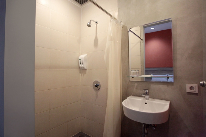 Imagen de la habitación del Hotel Legreen Suite Supomo. Foto 16