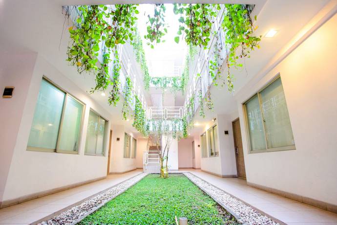 Imagen de los exteriores del Hotel Legreen Suite Tondano. Foto 11