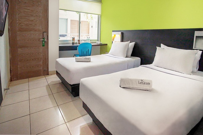 Imagen de la habitación del Hotel Legreen Suite Tondano. Foto 10