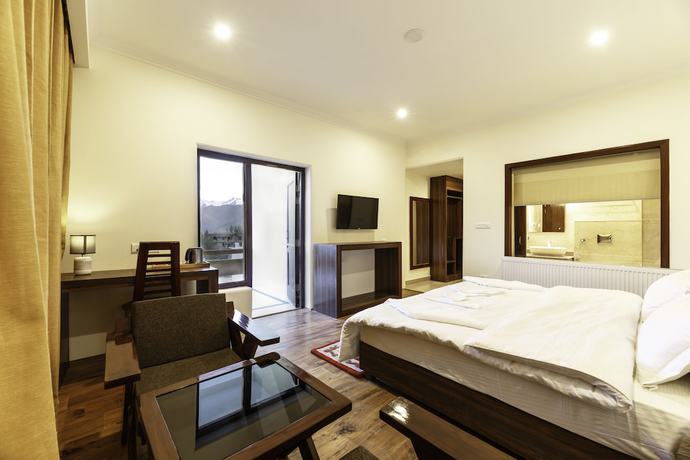 Imagen de la habitación del Hotel Leh Plaza. Foto 4