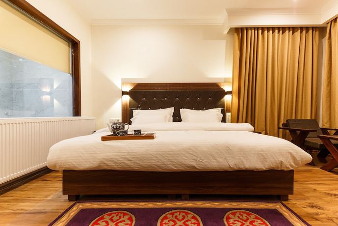 Imagen de la habitación del Hotel Leh Plaza. Foto 7