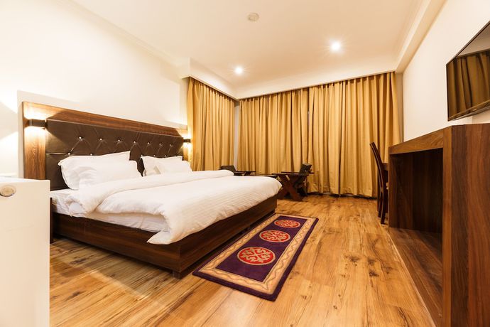 Imagen de la habitación del Hotel Leh Plaza. Foto 8