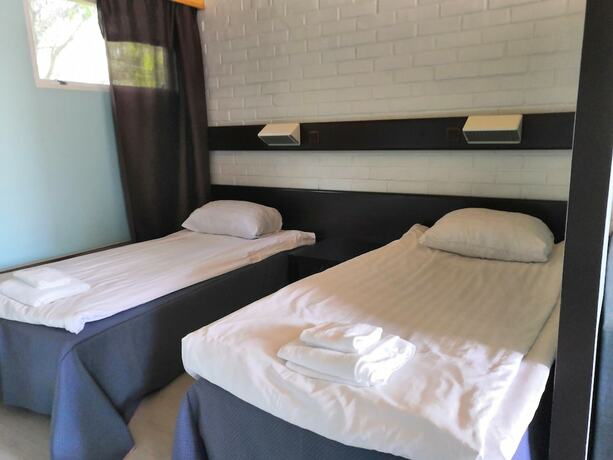 Imagen de la habitación del Hotel Leikari Bungalows. Foto 11