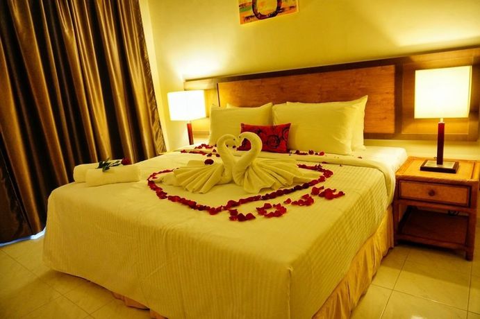 Imagen de la habitación del Hotel Leisure Cove And Apartments. Foto 13