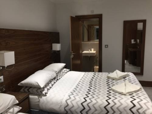 Imagen de la habitación del Hotel Leisure Inn. Foto 2