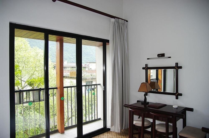 Imagen de la habitación del Hotel Leisure Inn Yangshuo. Foto 7