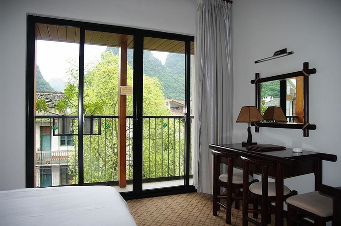 Imagen de la habitación del Hotel Leisure Inn Yangshuo. Foto 10