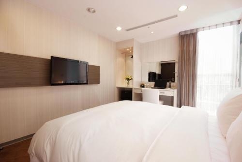 Imagen de la habitación del Hotel Leisure Taichung. Foto 10