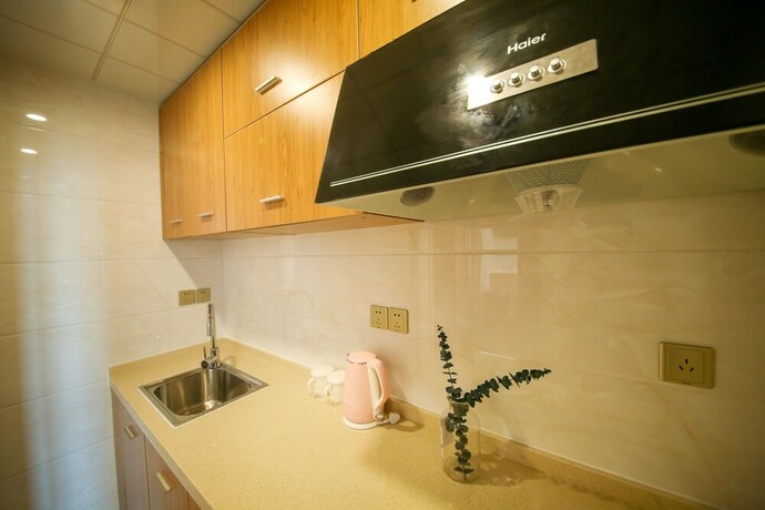 Imagen de la habitación del Hotel Lejiaxuan Boutique Apartment High-tech. Foto 23