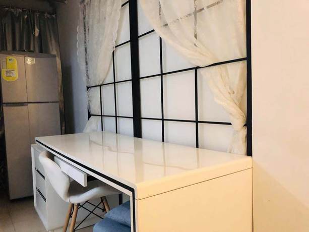 Imagen de la habitación del Hotel Leju 68 Apartment. Foto 3