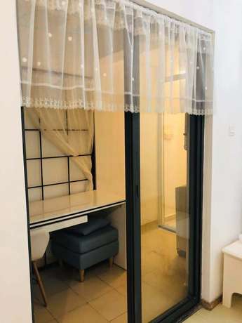 Imagen de la habitación del Hotel Leju 68 Apartment. Foto 4
